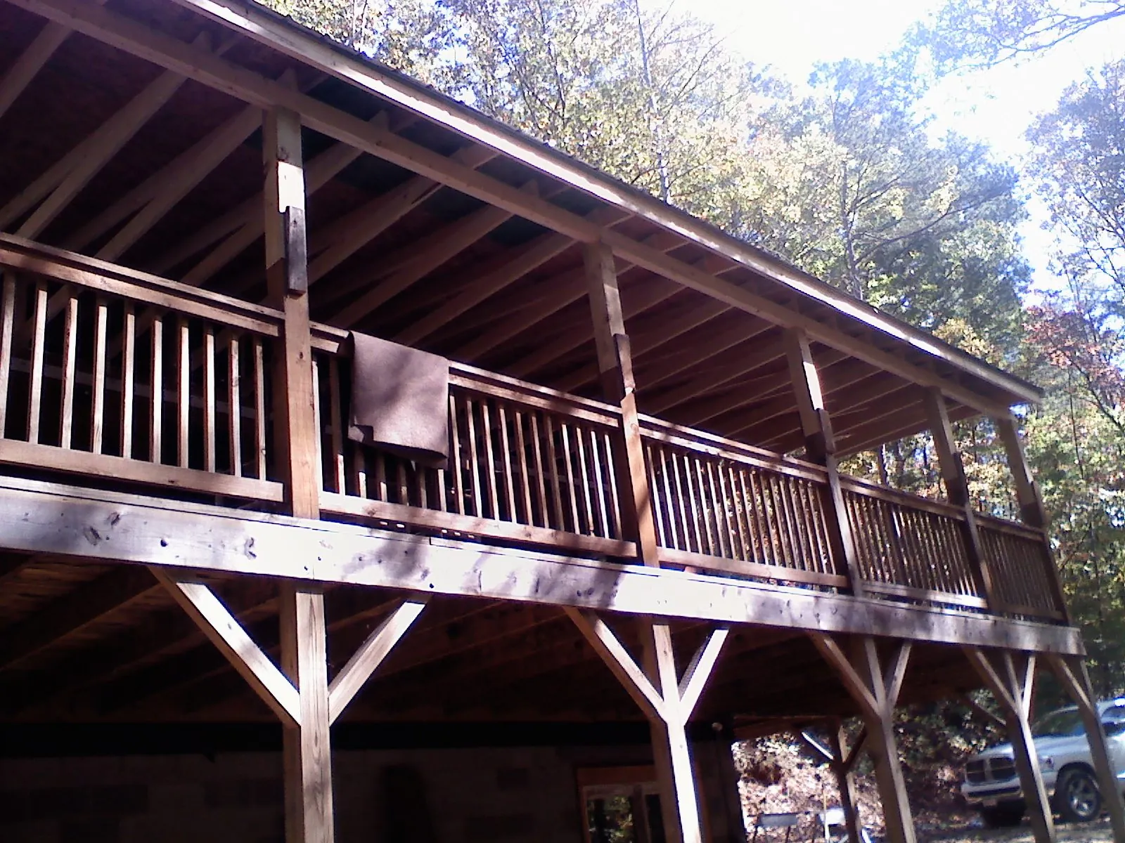 Timber framing under a new elevated porch and deck — Roof Leak Repair in Middlefield by Roofing Brothers